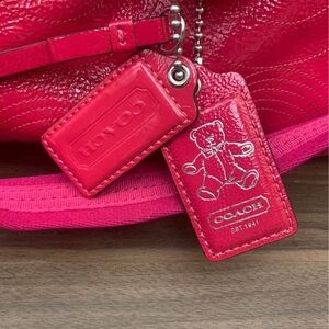 Hot pink leather coach diaper bag